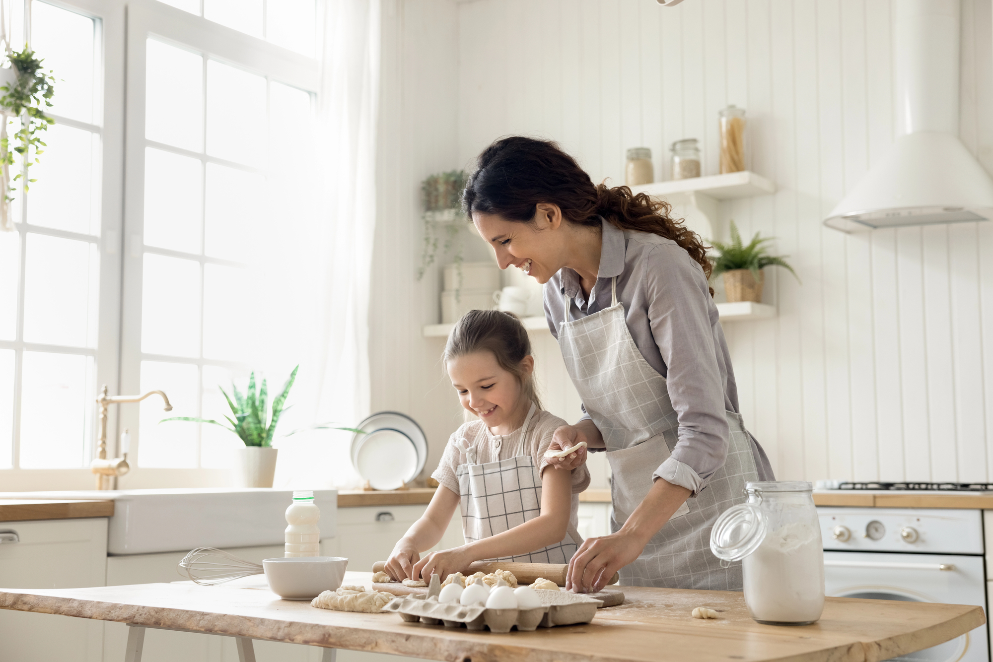 mother and child baking together